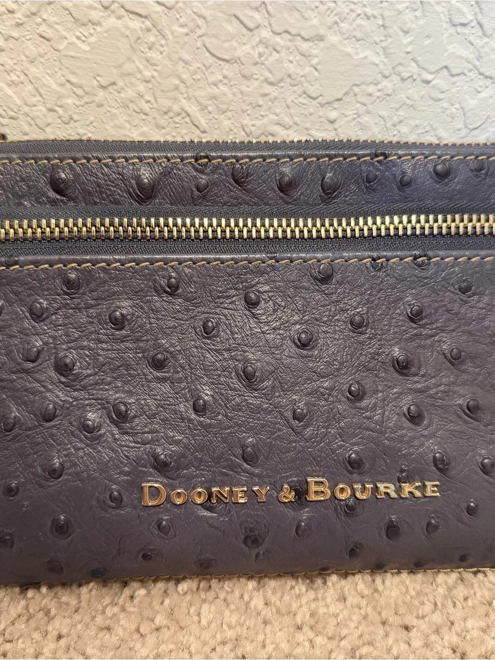Dooney & Bourke Navy Ostrich-Texture Leather Wristlet with Brown Strap
